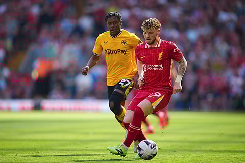 Harvey Elliott and Jeanricner Bellegarde fight for the ball